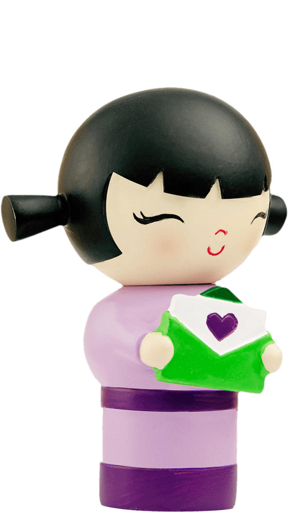 Best Friends Momiji doll with black pigtails, in a purple outfit, holding a green envelope with a purple heart detail. — Momiji Doll