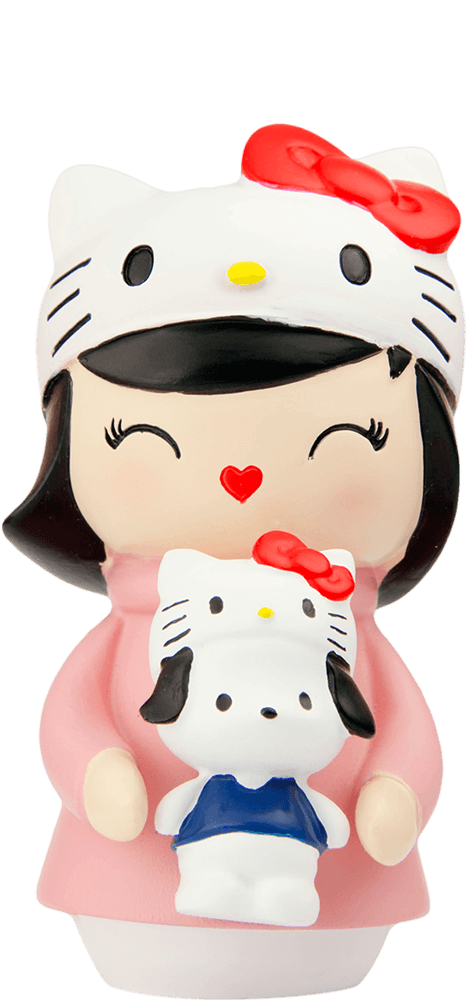 Momiji doll from the Hello Kitty Anniversary Trio wears pink, a Hello Kitty hat, and holds a matching Hello Kitty plush. — Momiji Doll