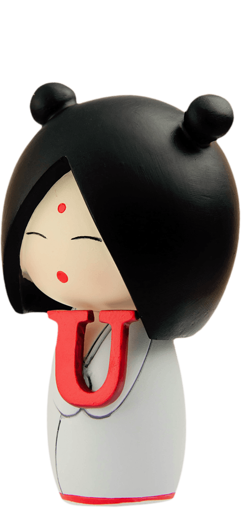 I heart U Momiji doll with black hair, closed eyes, and a red “U”; kawaii collectible hiding a secret message inside. — Momiji Doll