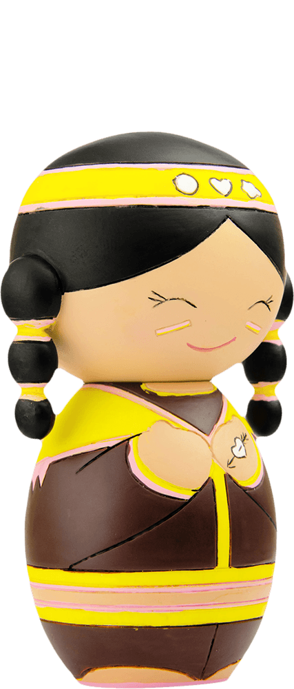Souzi Momiji doll with black braided hair, yellow-brown heart outfit, smiling face; collectible and hides a secret message. — Momiji Doll