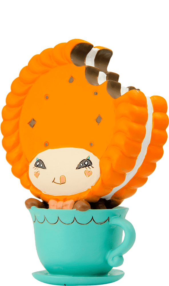 Dippy-D Momiji doll, an orange cookie character, smiles from inside a turquoise teacup with a kawaii cheerful vibe. — Momiji Doll
