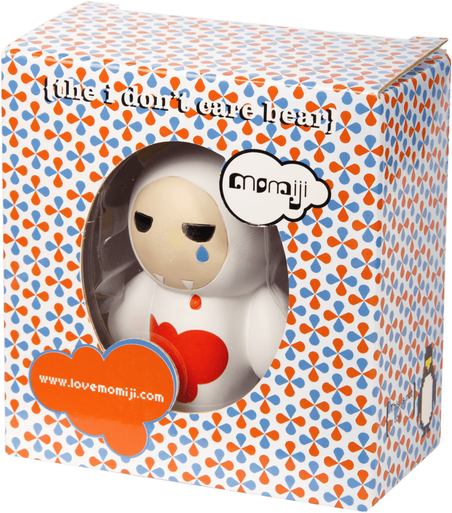 Boxed Momiji doll named "The I don't care bear" with heart pattern and label, kawaii collectible designed by artists. — Momiji Doll