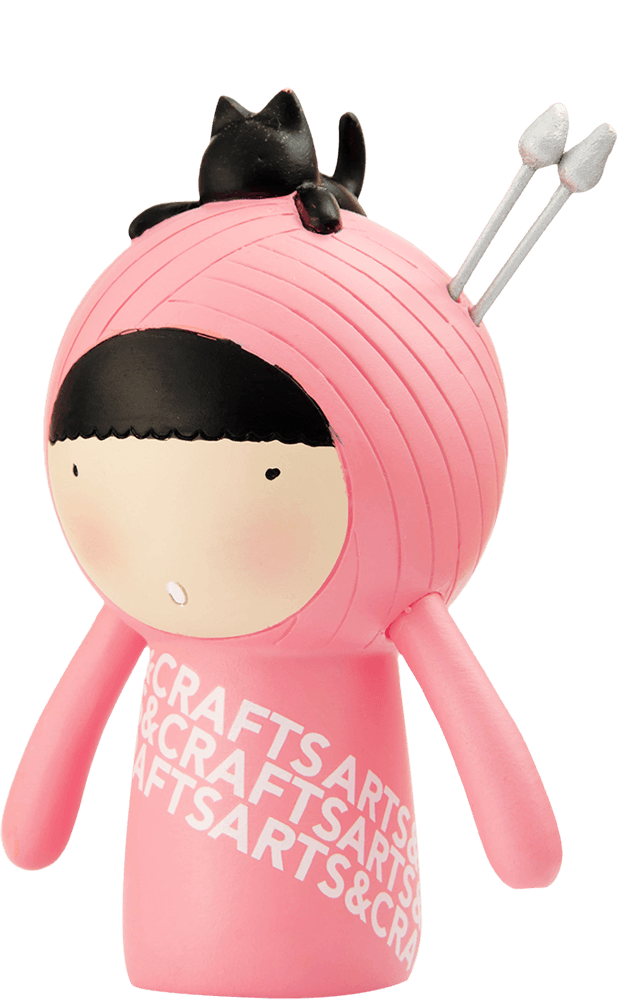 Purrl Momiji doll: pink, kawaii, with a cat on its head, holding knitting needles. "CRAFTSARTS" text visible. — Momiji Doll