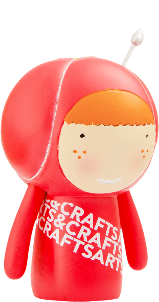 Cherie Momiji doll with bright orange hair, white hood, small antenna on top, and ARTS&CRAFTS text across the chest. — Momiji Doll