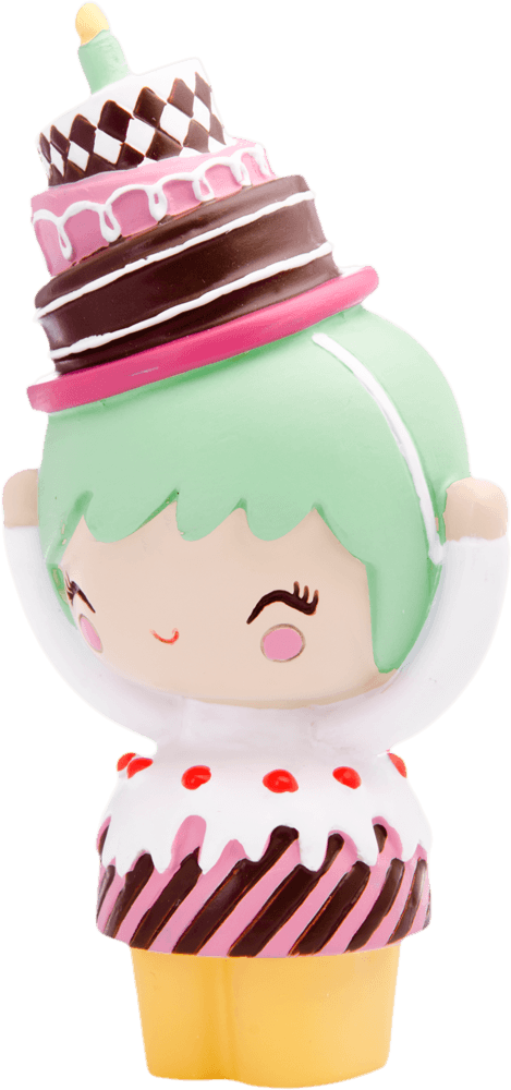 Birthday Girl Momiji doll with green hair, a cheerful face, and a cake-shaped dress topped with a candle. — Momiji Doll