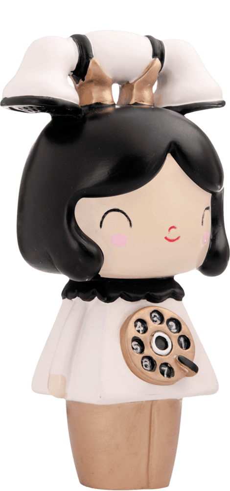 Chatty Momiji doll with black hair, a rotary phone dial on its chest, and a vintage phone perched on top of its head. — Momiji Doll