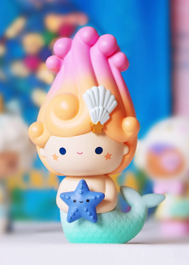 Mizu 3 Momiji doll: pastel mermaid with pink hair, blue starfish, and shell hair accessory. Vinyl collectible character doll. — Momiji Doll