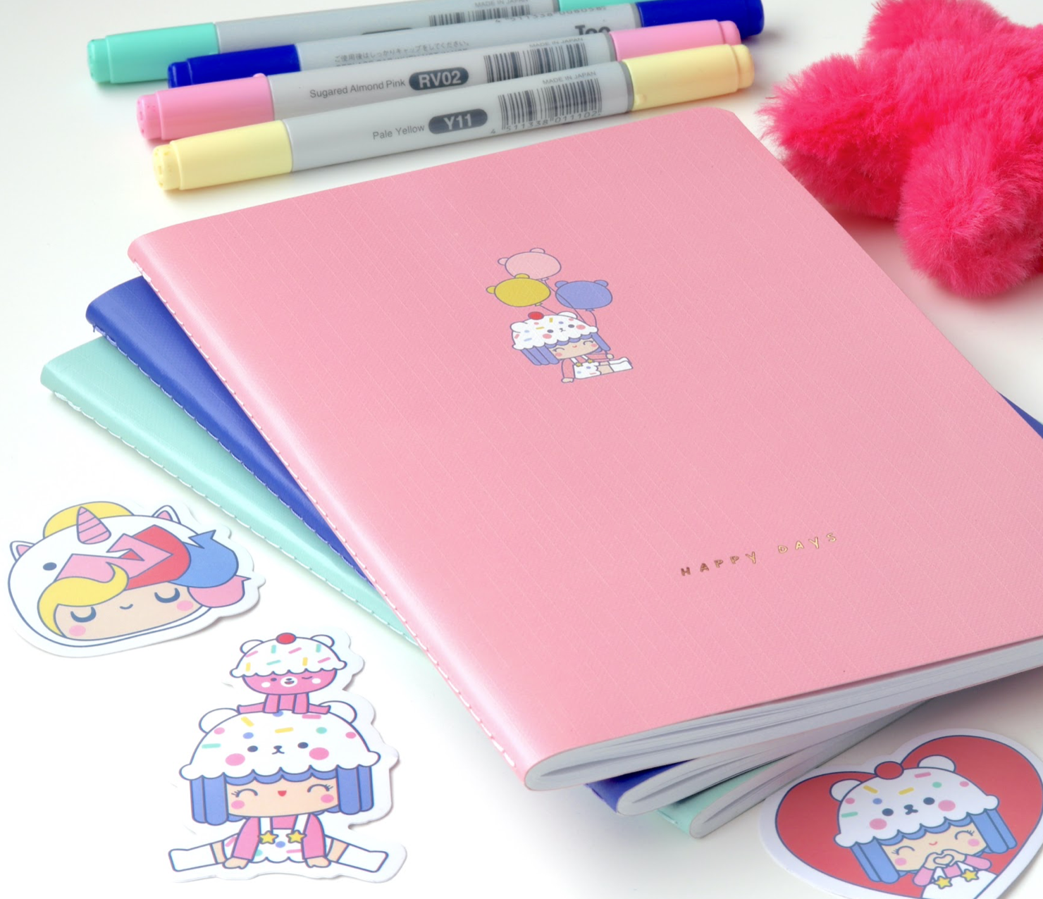 Momiji doll with pink, blue, and teal HAPPY DAYS notebooks, stitched binding, cute stickers, pastel markers, fuzzy pink accessory. — Momiji Doll