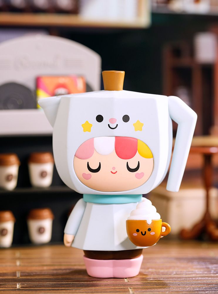 Perfect Partners - Beanie: Momiji doll in a teapot costume hugs a smiling mug, set in a cozy café with warm colours and cute details. — Momiji Doll