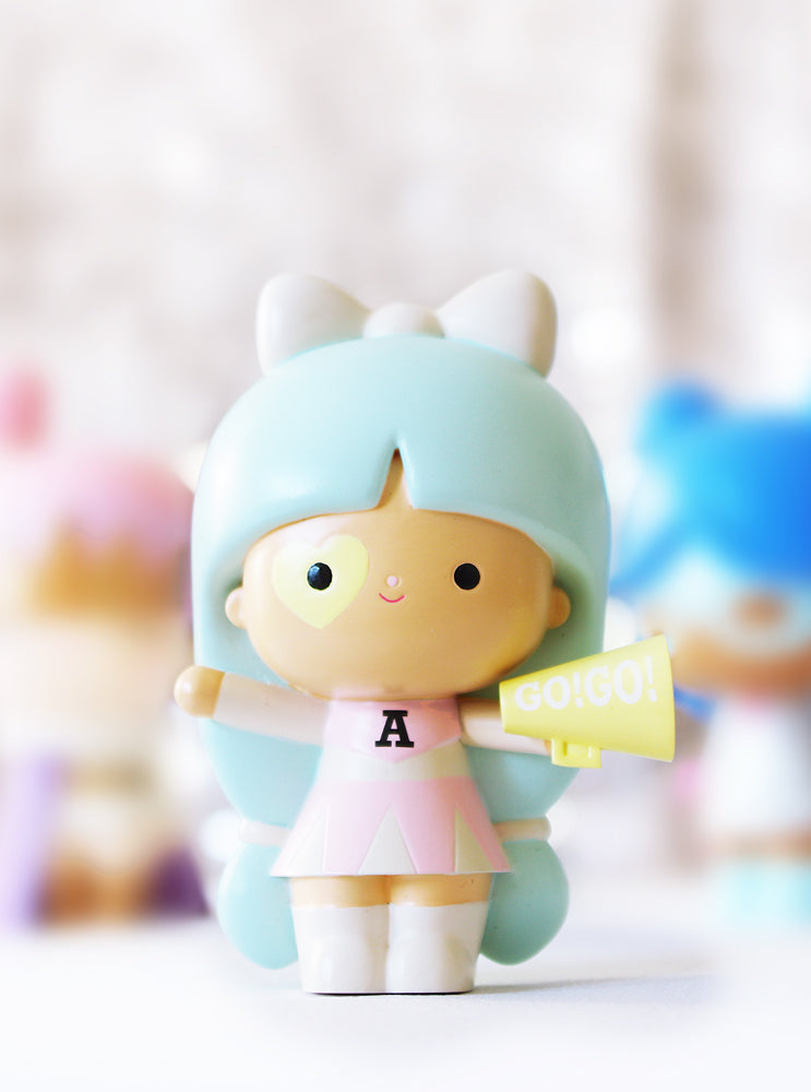 Courageous You Momiji doll with mint hair, white bow, pink dress, and yellow GO! GO! megaphone; a collectible character keepsake. — Momiji Doll